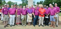 Some of the 28 Episcopal Church bishops who marched in the Aug. 15 pilgrimage to commemorate Jonathan Daniels and the other martyrs of the civil rights movement in Alabama pose in Hayneville, the site of the gathering.